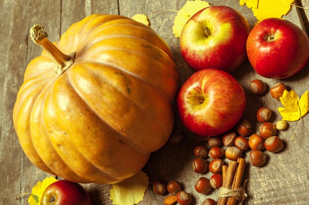 Pumpkins on wooden board