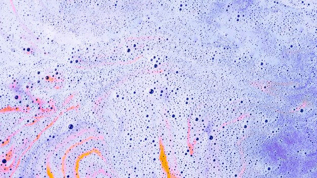 Purple bath bomb bubble foam background