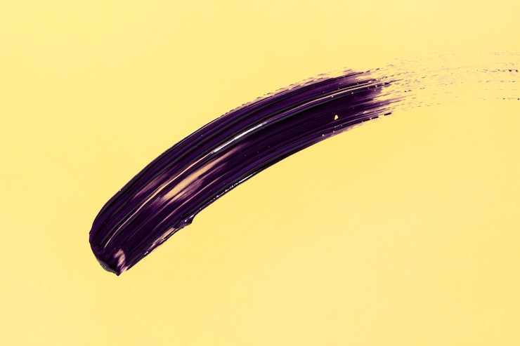 Free Photo purple brush stroke on yellow background