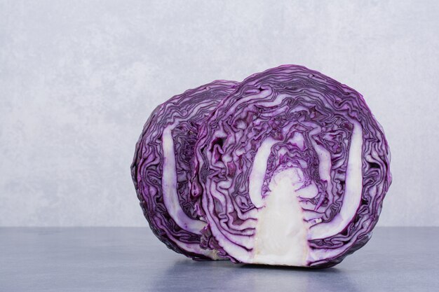 Free photo purple color cabbage isolated on concrete surface