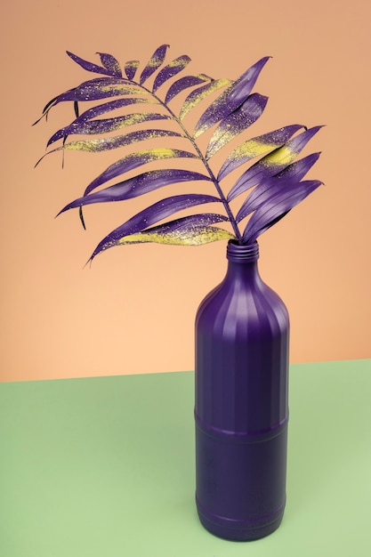 Purple exotic leaf in purple vase