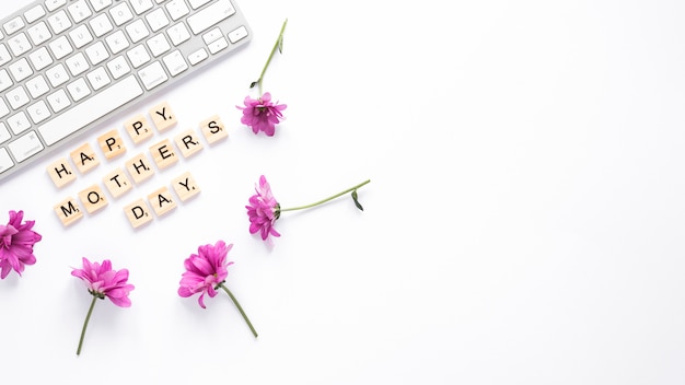 Purple flowers with Happy Mothers Day inscription 