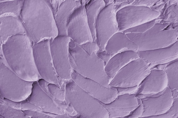 Free photo purple frosting texture background close-up