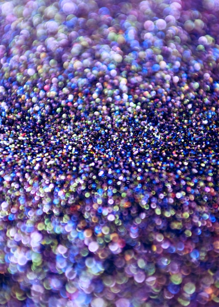 Purple glitter bokeh lights background