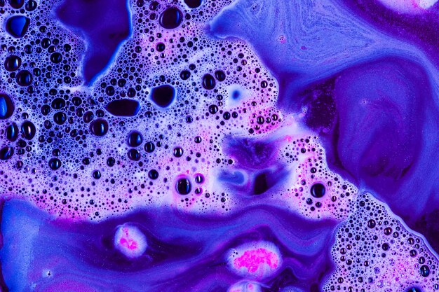 Purple liquid with pink foam