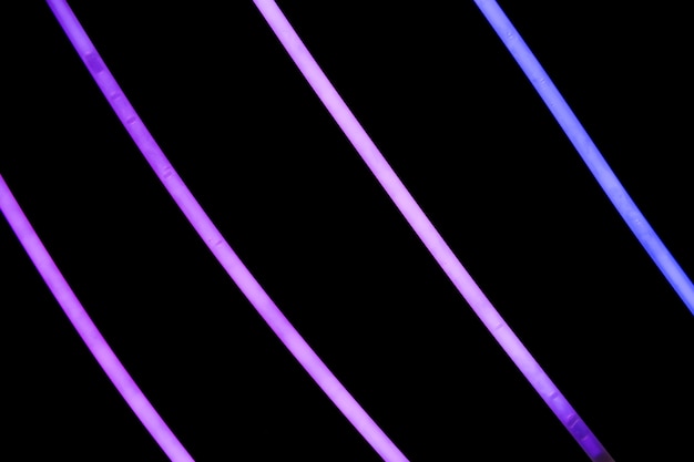 Purple neon stripes on black background