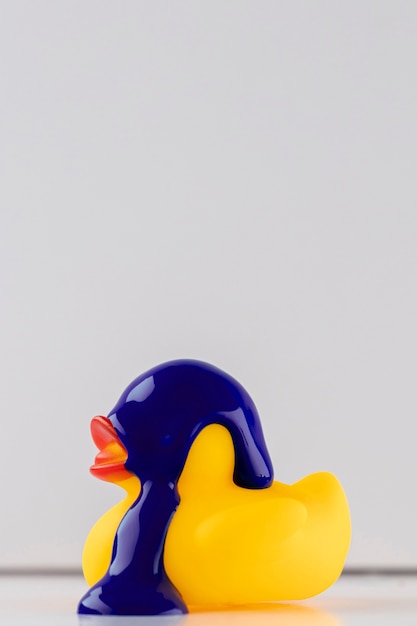Purple paint on yellow rubber duck