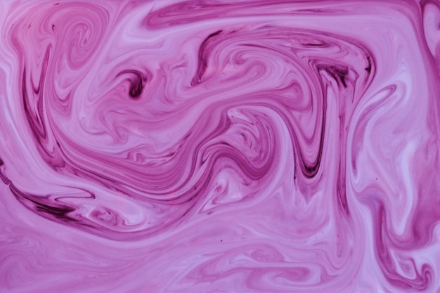 Фиолетовый и розовый смешанный жидкий текстуру фона