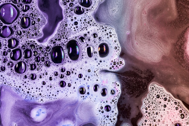 purple and pink suds mixing