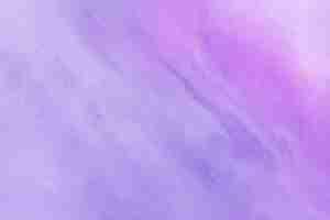 Free photo purple and pink watercolor texture background