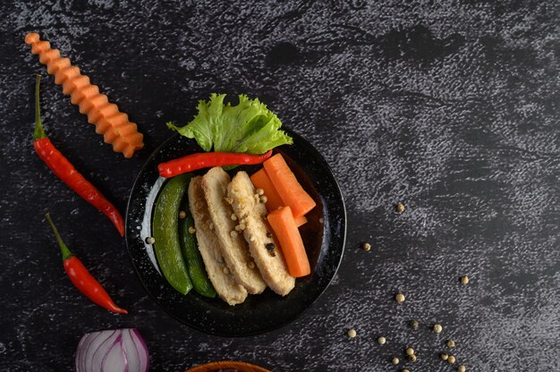 Purple rice berries cooked with grilled chicken breast. Pumpkin, carrots, and mint leaves in a dish, clean food.