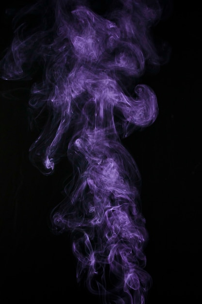 Purple smoke steam isolated on black background