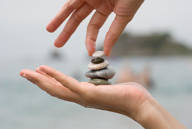 Putting the last pebble on a pile of stones