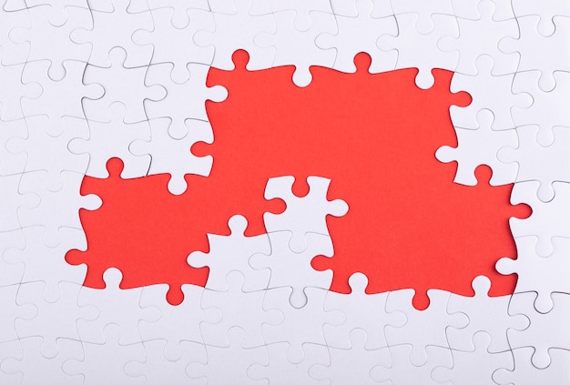 Puzzle pieces and red background