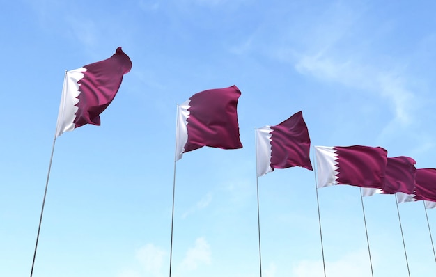 Foto gratuita bandiera del qatar che sventola sul fondo del cielo blu
