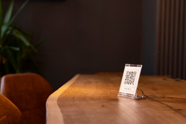 Free photo qr code on the counter of a bar