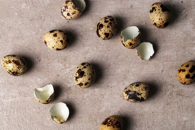 Quail eggs on rustic surface