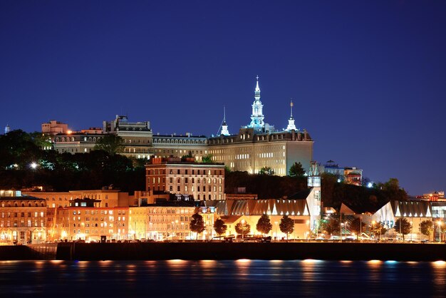 Quebec City skyline at dusk over river viewed from Levis.