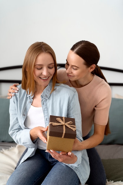 Free photo queer couple celebrating birthday together