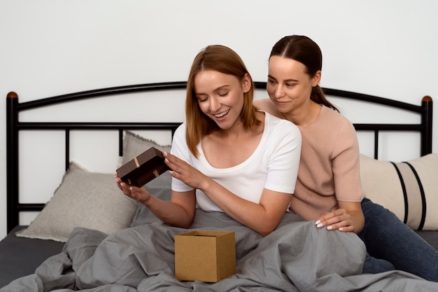 Free photo queer couple celebrating birthday together