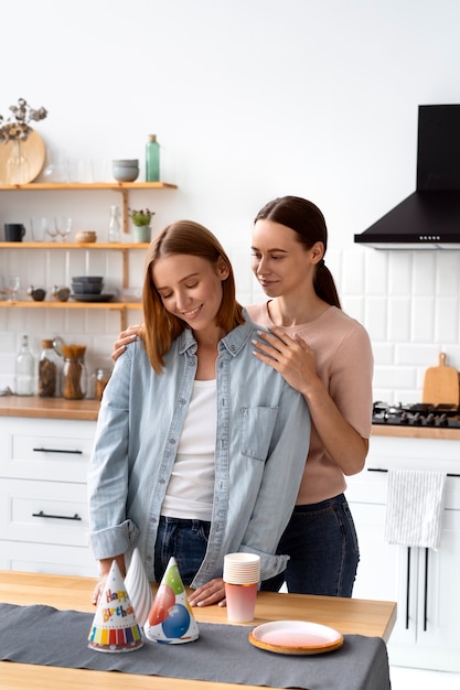 Free photo queer couple celebrating birthday together