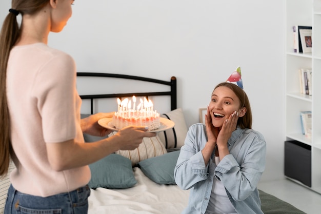 Free photo queer couple celebrating birthday together