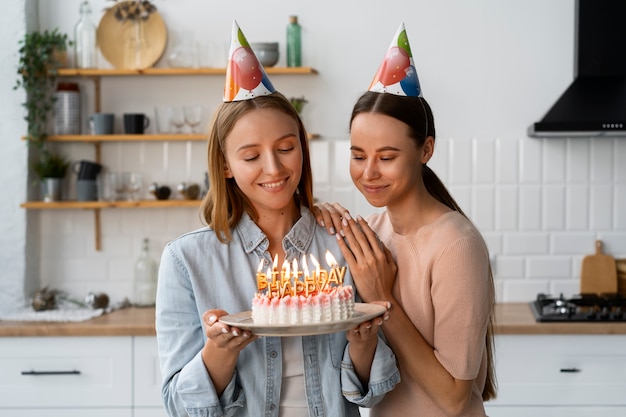 Queer couples celebrating birthday