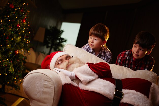 Quiet brothers with santa claus