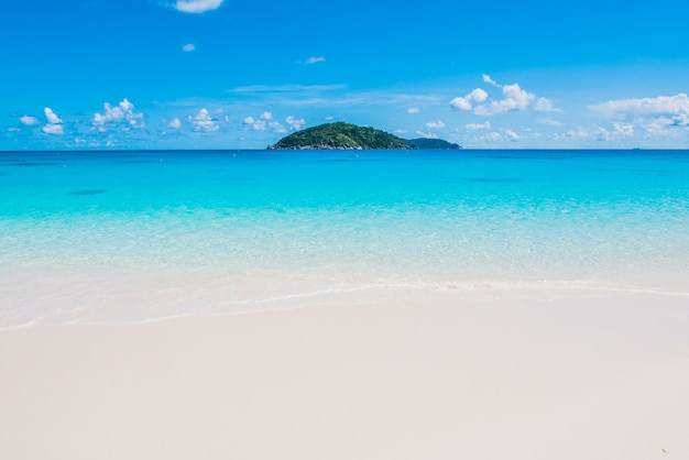 Quiet sea with island in the distance