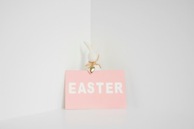 Rabbit statuette and Easter paper 