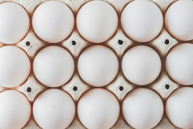 Rack with white eggs