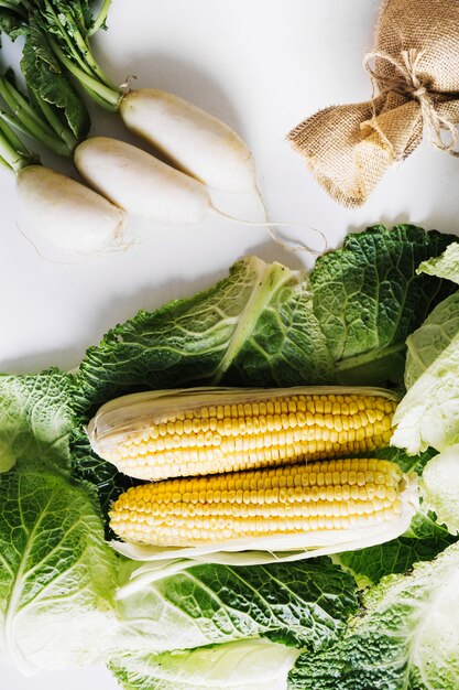 Radish and corn on cabbage leaves