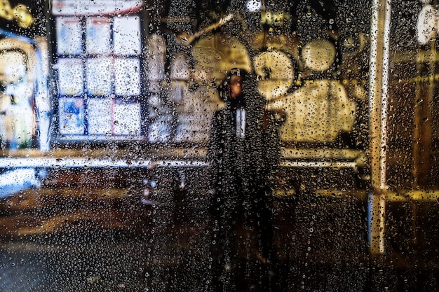 無料写真 都市の背景に対する雨の影響