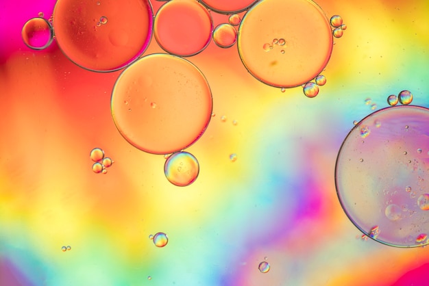 Free photo rainbow abstract background with bubbles