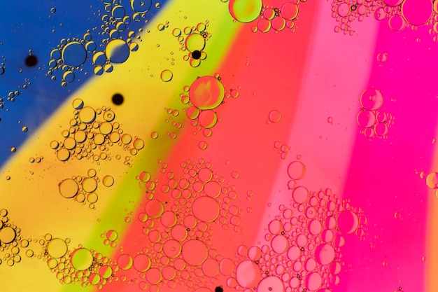 Free photo rainbow background with bubbles