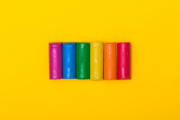 Free photo rainbow colored plasticine sticks