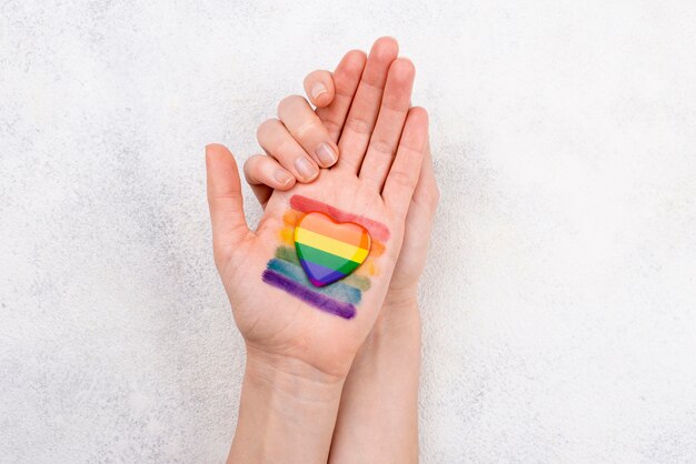 Rainbow flag painted on hand