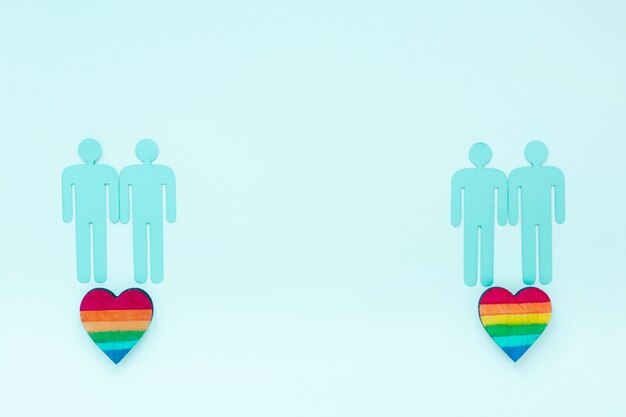Free Photo rainbow hearts with gay couples icons