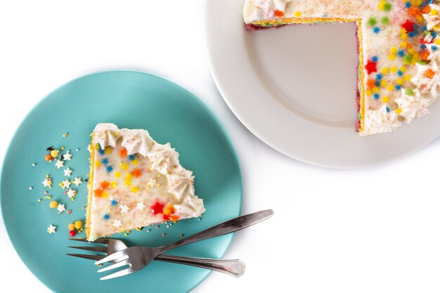 Rainbow layer cake isolated on white background