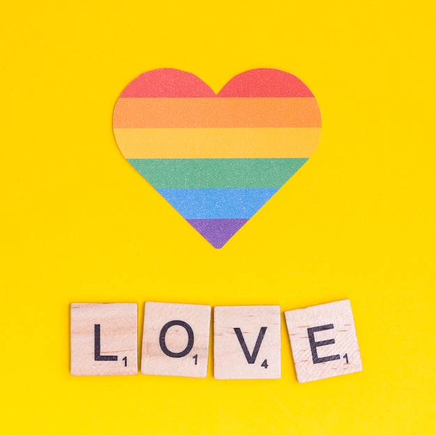 Free photo rainbow lgbt heart with love sign