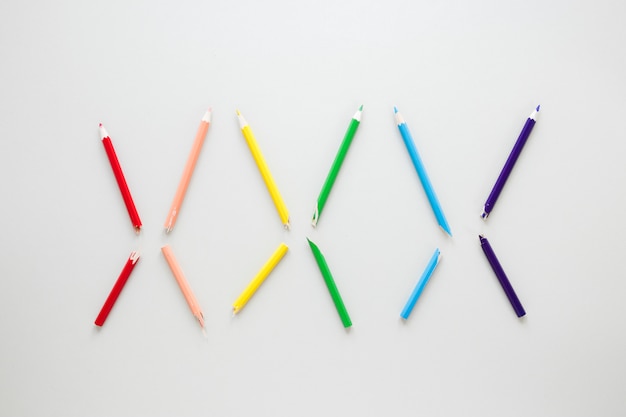 Free photo rainbow made of six colorful pencils