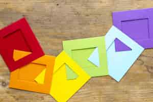 Free photo rainbow origami on desk