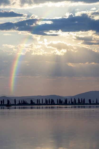 Rainbow in the sky with nature landscape