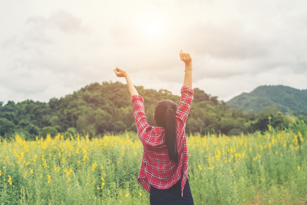 Free photo raised women harmony flower sunset