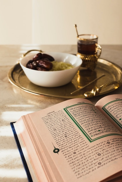 Ramadan concept with open quran and dates