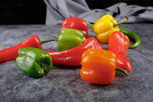 Random selection of color bell peppers and hot chilies.