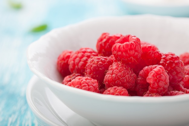Raspberries in a bowl close up