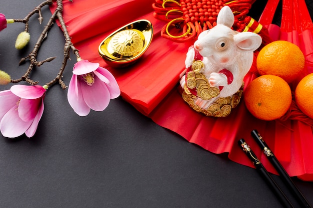 Rat figurine and magnolia chinese new year