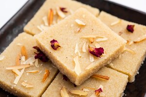 rava barfi or sooji burfi or barfee is an indian sweet made with semolina, sugar, ghee and almonds