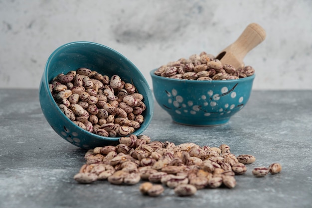 Free photo raw bean grains displayed in bowls.